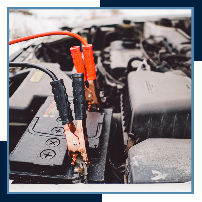 car battery with jumper cables hooked up